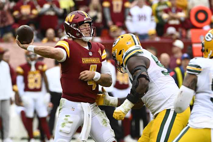 Commanders quarterback Taylor Heinicke converts a crucial third down against the Packers in Week 7.